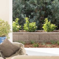 Low retaining wall built from Limestone coloured Heron blocks | Featured image for Heron Range.