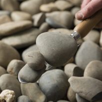 Photo of Oversise Nambucca River Pebbles | Featured Image for Nambucca River Pebble Oversise Product Page by Centenary Landscaping Supplies.