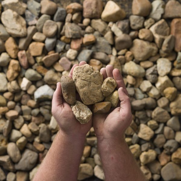 Photo of River Pebble Garden Stones | Featured Image for River Pebble 40-70mm Product Page by Centenary Landscaping Supplies.