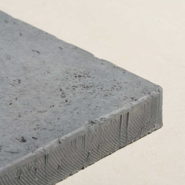 Rear side view of the corner of a Bluestone coloured Antique paver | Featured image for Antique Pavers.