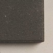 Top view of the corner of a charcoal coloured Havenslab paver | Featured image for Havenslab Pavers.