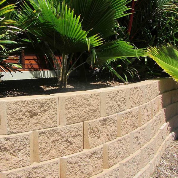 Low curving wall built from Moreton blocks | Featured image for Moreton Blocks.