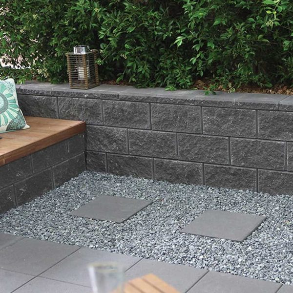 Low wall constructed from charcoal coloured Verawall blocks | Featured image for Versawall Range.