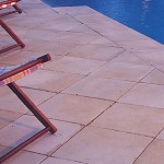 Pavers installed around a pool | Featured image for Benefits of Sealing Pavers: Why it is Important and Necessary blog for Centenary Landscaping.