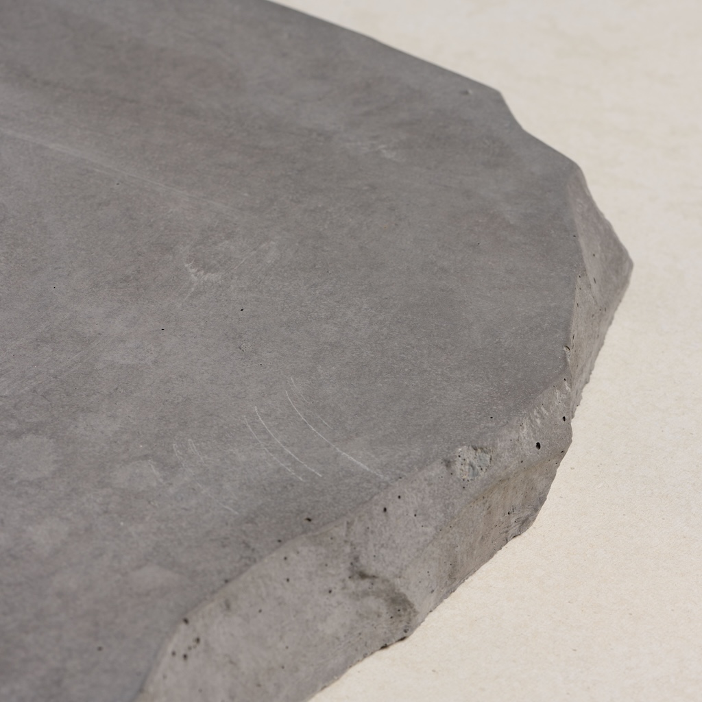 CentenaryLandscapePaversAug202_030 Grey concrete paver with a textured surface and irregular edges.