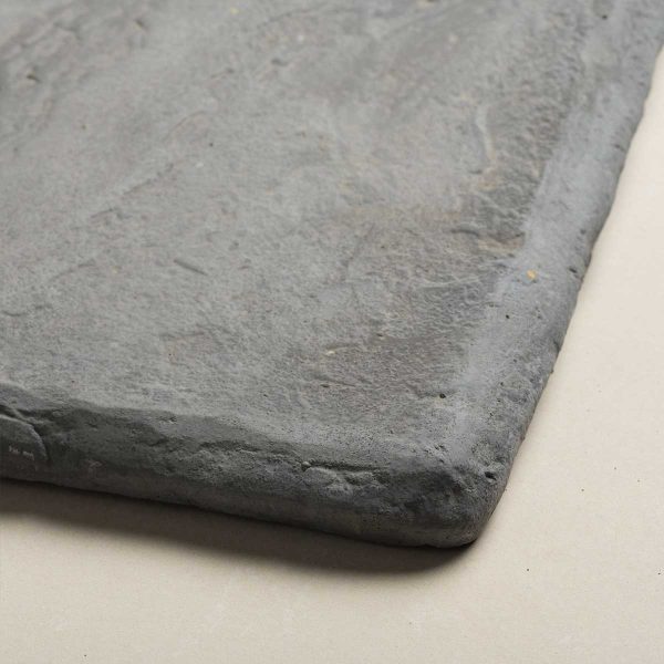 Side view of a the corner of a Bush Rock tread paver | Featured image for Bush Rock Tread.
