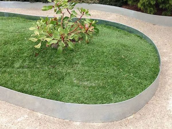 Photo of a garden bed created with FormBoss Galvanised Steel Edging | Featured Image for FormBoss Galvanised Steel Edging product page by Centenary Landscaping Supplies.